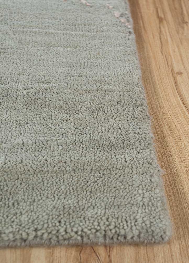 urban pause by kavi green wool and silk Hand Knotted Rug - Corner