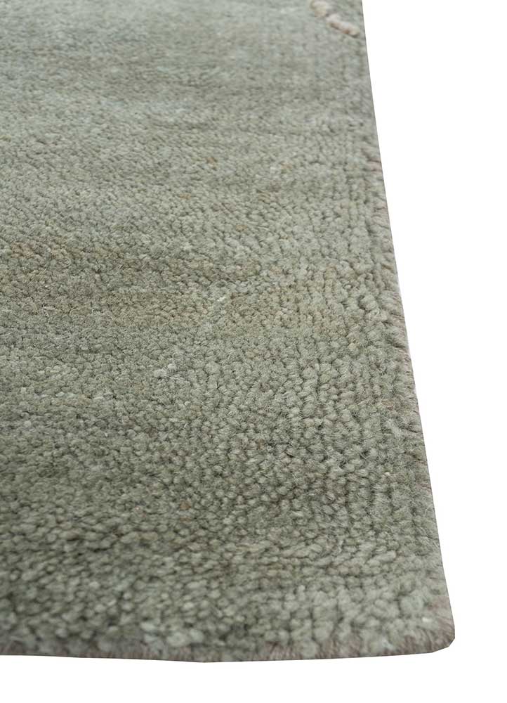 urban pause by kavi green wool and silk Hand Knotted Rug - Corner