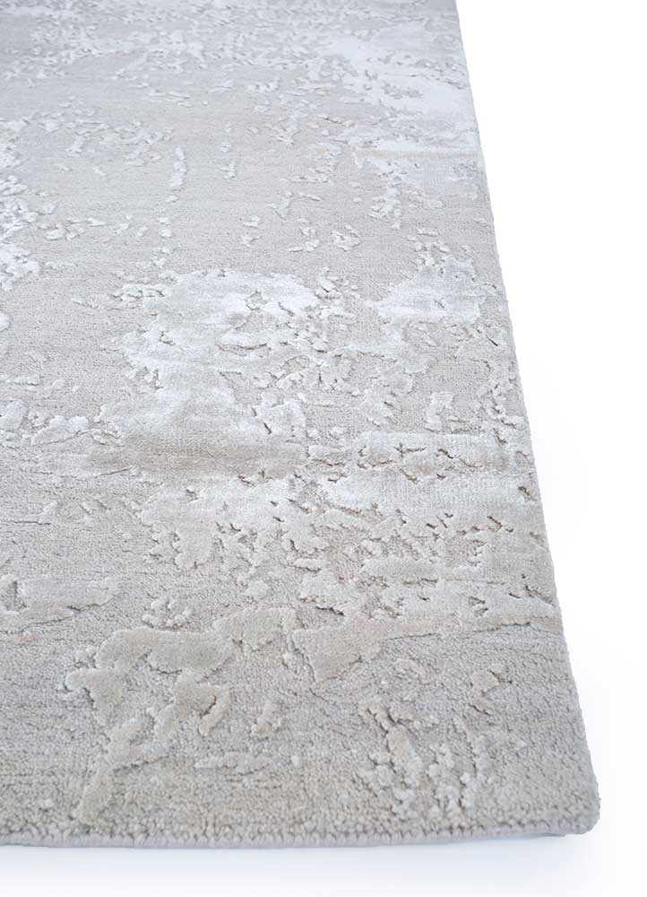 chaos theory by kavi ivory wool and bamboo silk Hand Knotted Rug - Corner