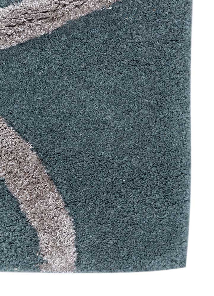 contour blue wool and viscose Hand Tufted Rug - Corner